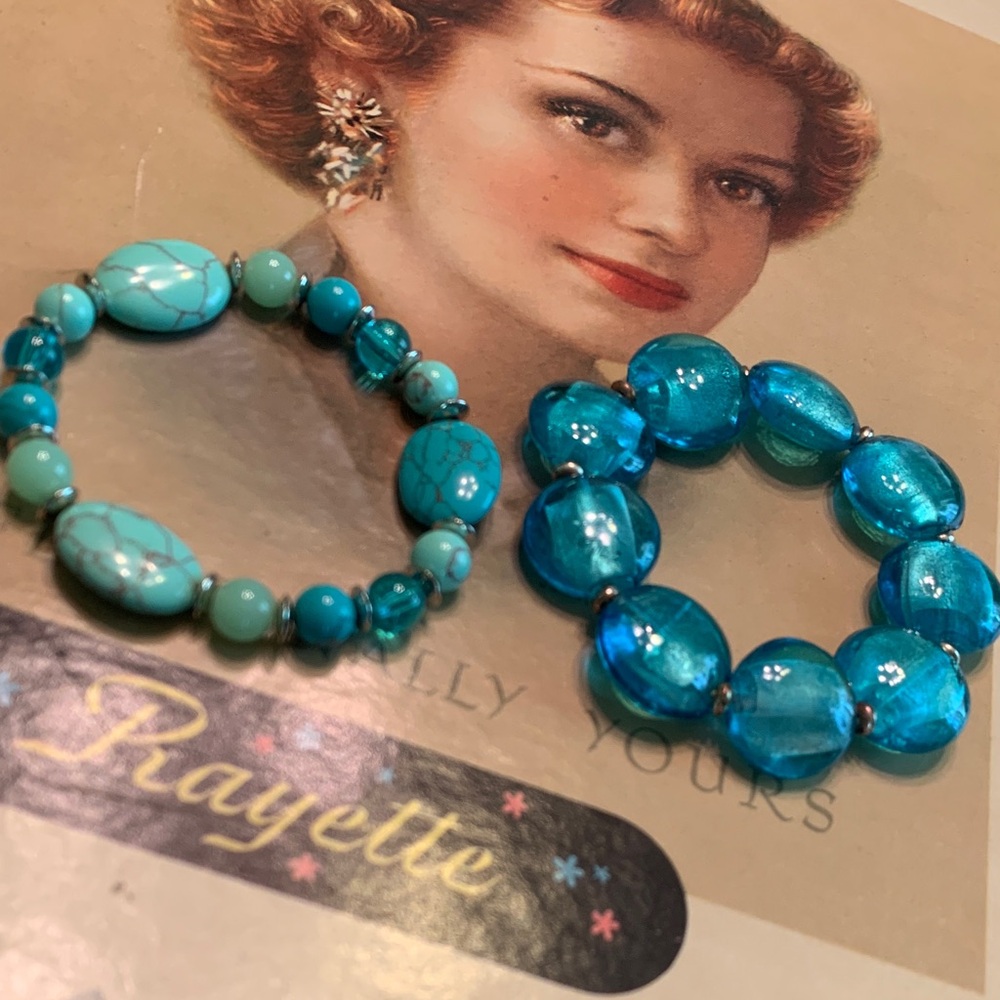 2 blue stretch bracelets